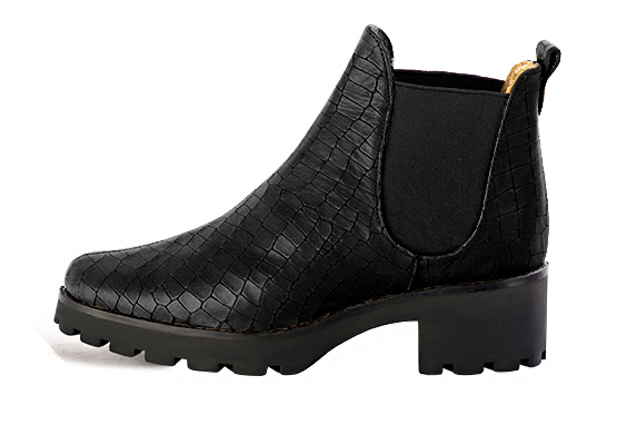 Satin black women's ankle boots, with elastics. Round toe. Low rubber soles. Profile view - Florence KOOIJMAN